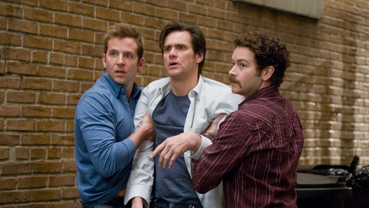 Bradley Cooper, Jim Carrey and Danny Masterson in the 2008 film 'Yes Man'.