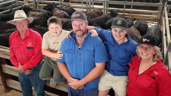 Hamilton cattle sale, HRLE, Hamilton, L-R: Alec Moore, Weeran Angus, Damian Cameron, with his children Duncan, 1-year-old, &amp; Ben, 13, from Penhurst, and Jo Moore, Weeran Angus. Picture: Yuri Kouzmin