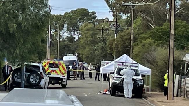 Forensice crime-scene police on Symons Street after the shooting and stabbings. Picture: Isaac Selby