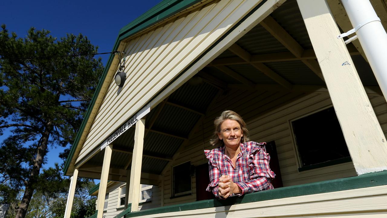 Julie Smith, President of the Pullenvale Progress Association, at the Community Hall where pineapples were packed in the suburb’s farming days. It’s now the social hub of the community. Picture: David Clark