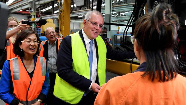 Scott Morrison tours the William Adams CAT equipment hiring centre in Melbourne on Monday. Picture: AFP