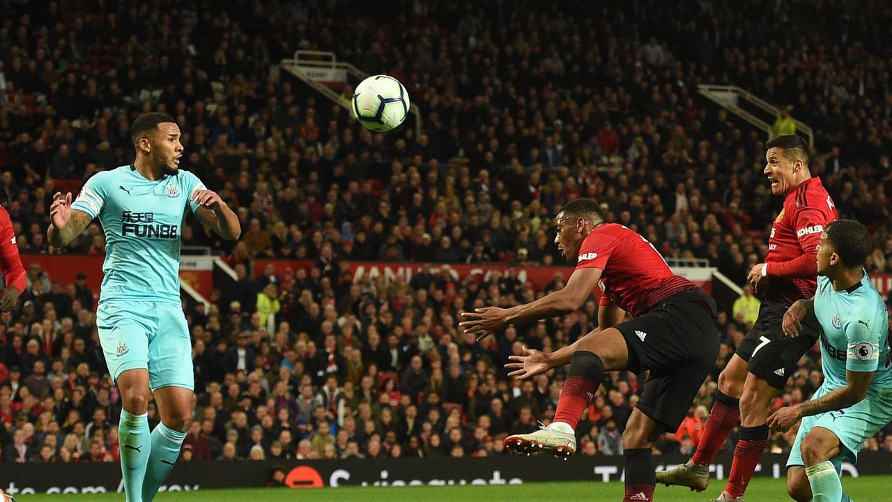 Manchester United's Chilean striker Alexis Sanchez scores the winner against Newcastle. (Photo by Oli SCARFF / AFP) /