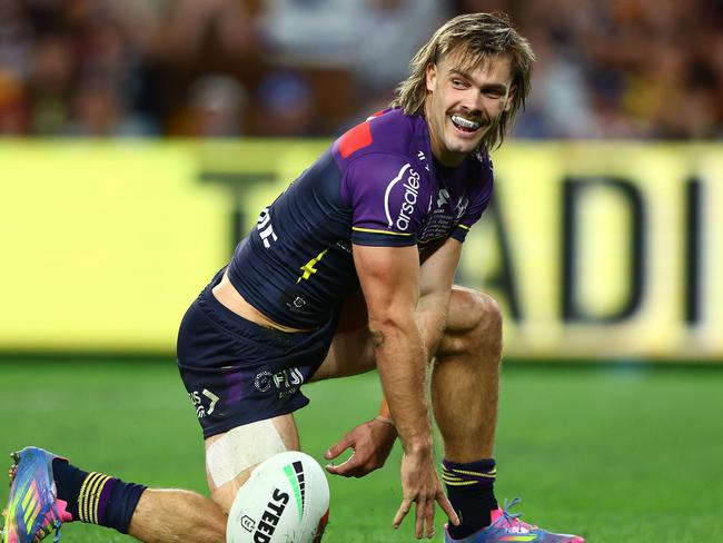 BRISBANE, AUSTRALIA - MAY 04: Ryan Papenhuyzen of the Storm celebrates a try during the round nine NRL match between Melbourne Storm and Canberra Raiders at Suncorp Stadium, on May 04, 2025, in Brisbane, Australia. (Photo by Chris Hyde/Getty Images)