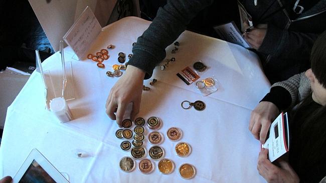 Virtual exchange... Bitcoin buttons. Picture: Frank Jordans/AP