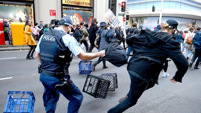 Police followed the crowd closely through the city. Picture: NCA NewsWire / Jeremy Piper