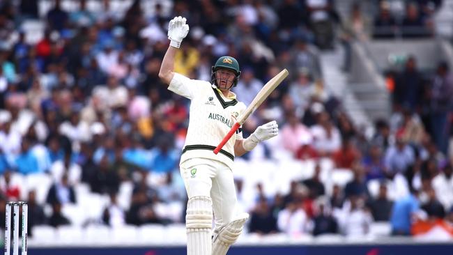 Marnus Labuschagne of Australia drops his bat after being hit on the hand. Picture: Ben Hoskins/Getty Images for Surrey CCC