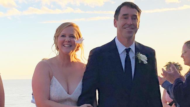 Amy Schumer: “We knew really quickly. I was never really interested in getting married. But then we met and I wanted to be partnered up with this guy.” (Pictured: Schumer with husband Chris Fischer. Pic: Instagram)