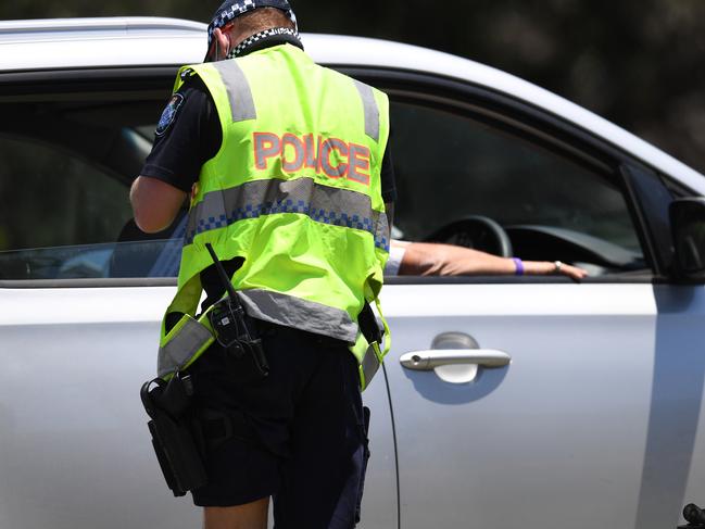 GOLD COAST, AUSTRALIA - NewsWire Photos - OCTOBER 28, 2021. Police perform border checks at the Queensland - New South Wales border at Coolangatta on the Gold Coast. Picture: NCA NewsWire / Dan Peled