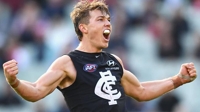 Carlton star Patrick Cripps celebrates a goal.