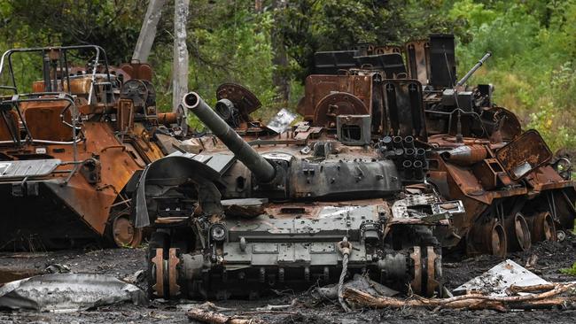 A destroyed Russian tank and armoured personnel carriers on the outskirts of Izyum in the Kharkiv region this week. Picture: Juan Barreto / AFP