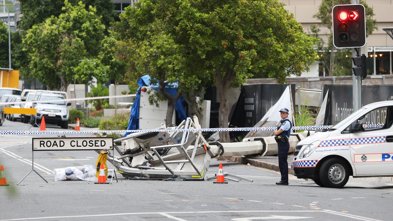 Officers on the scene of the crane collapse.