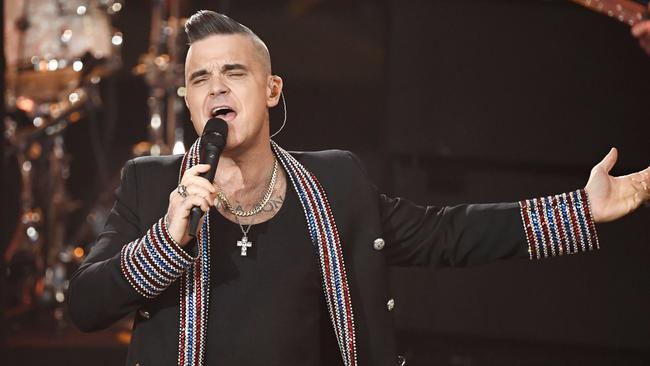 Robbie Williams will perform at the Melbourne Grand Prix, his only Australian show for 2020. Picture: Jens Meyer / POOL / AFP)