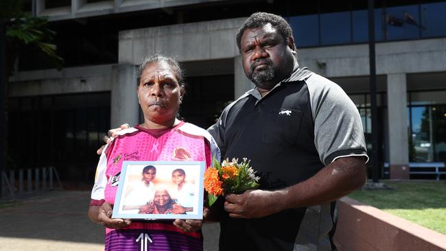 Alison Bernard's mother and uncle Edwina Bernard and Teddy Bernard, pictured with a photo of Alison (left) with her grandmother and sister. The pair were in the Cairns Coroner's Court on the first day of the coronial inquest into Alison Bernard's disappearance in December 2021. Picture: Brendan Radke