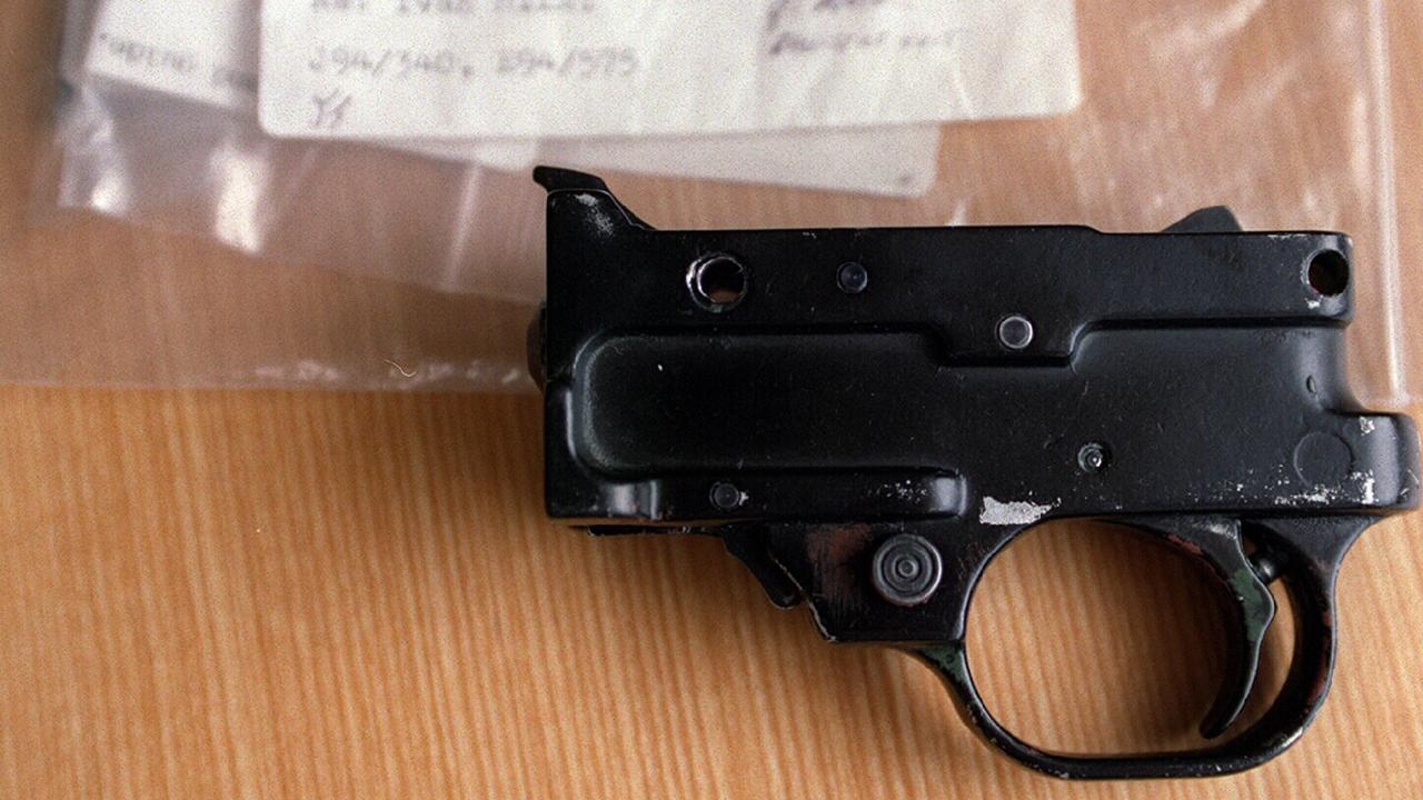 A gun part secreted in the wall of Milat’s house.