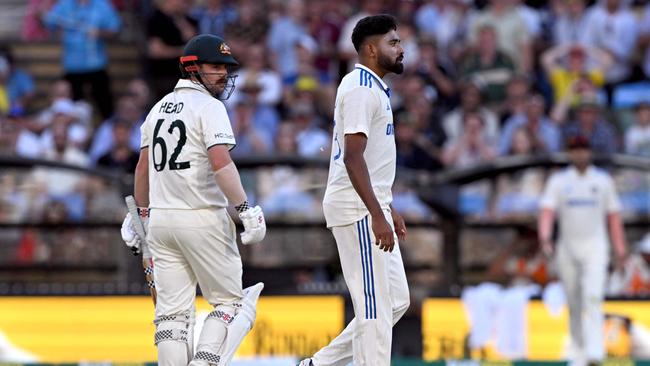 Travis Head looks back at Indian bowler Mohammed Siraj after his dismissal on Saturday evening Picture: AFP