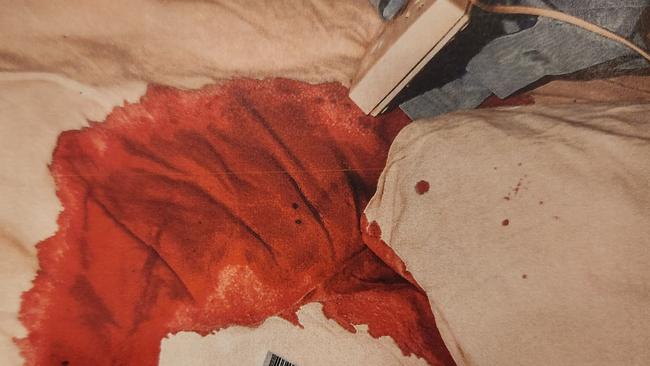 The bloody sheets after Mr Robinson stabbed Mr Whitehead in the neck during the home invasion. Photos: Courts SA