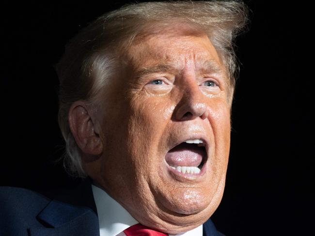 US President Donald Trump holds a Make America Great Again rally as he campaigns at Orlando Sanford International Airport in Sanford, Florida, October 12, 2020. (Photo by SAUL LOEB / AFP)