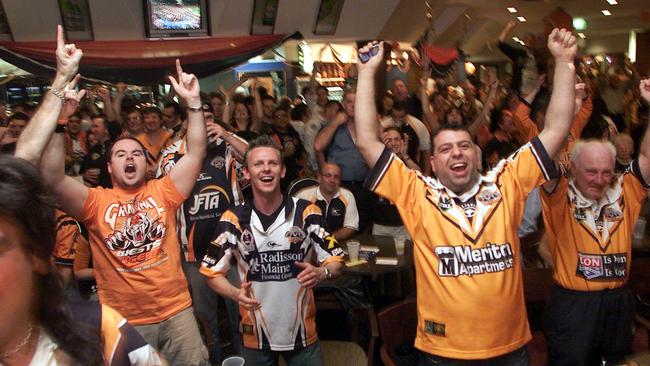 Fans at the club cheering on Wests Tigers during the 2005 NRL grand final against the North Queensland Cowboys.