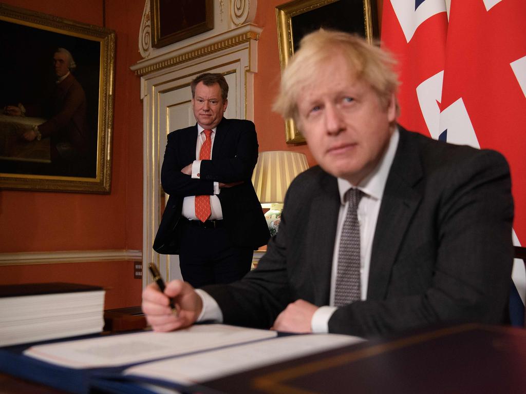 Smiling on the inside … Boris Johnson with UK chief trade negotiator, David Frost. Picture: AFP