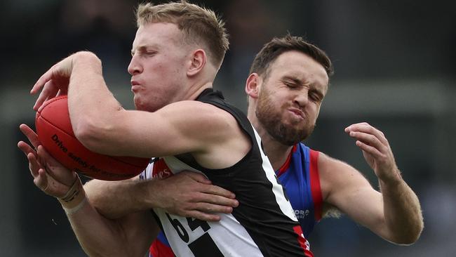 Hayden Crozier tackles Jack Raines at AIA Centre. Picture: Martin Keep/Getty Images