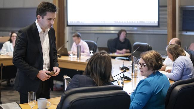 David Grace who will have to apologise at tonight's council meeting for threatening to put Cr Paula Wriedt on her tail was absent tonight. Cr Paula Wriedt is in a Blue jacket. Mayor Dean Winter is also shown at the meeting. Picture Eddie Safarik