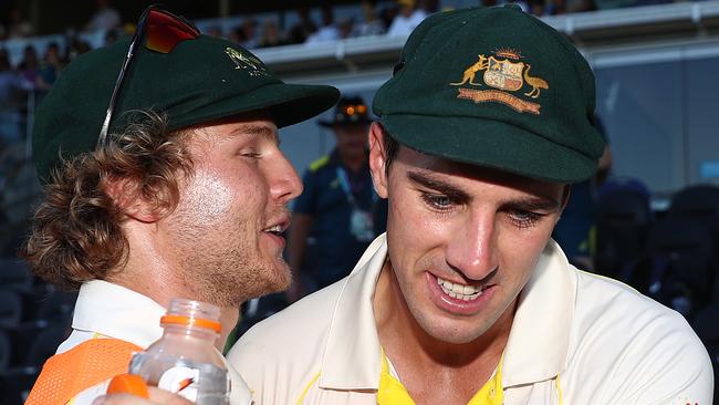 Pat Cummins and Will Pucovski celebrate Australia’s first Test win. Picture: Getty Images 