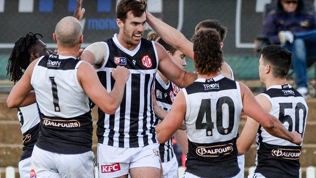 Port Adelaide ruckman Scott Lycett celebrates kicking a goal against the Eagles. Picture: Brenton Edwards.