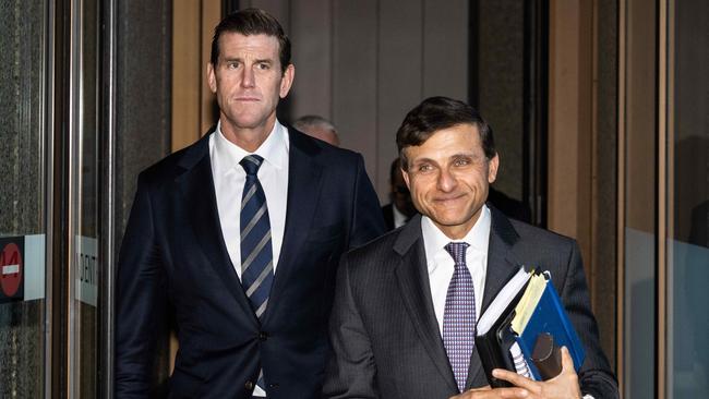 Ben Roberts-Smith, left, and Arthur Moses SC leaving the Federal Court in Sydney on Wednesday. Picture: NCA NewsWire/James Gourley