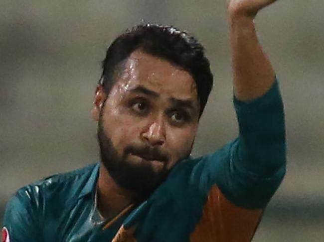 In this picture taken on October 24, 2018, Pakistan cricketer Faheem Ashraf bowls during the first Twenty20 cricket match between Australia and Pakistan at Sheikh Zayed Stadium in Abu Dhabi. (Photo by - / AFP)