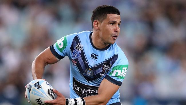 Cody Walker offloads the ball during game two of the 2020 State of Origin series between the New South Wales Blues and the Queensland Maroons at ANZ Stadium. Picture: Mark Kolbe/Getty Images