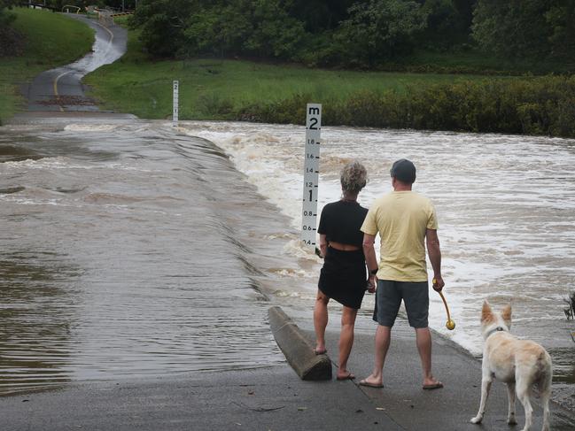 Kriedeman Rd at Guanaba on the Gold Coast was unrecognisable after storms then floods tore through the area. Picture: Glenn Hampson