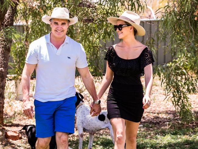 Robbie and Daisy Katter at their Mt Isa home with their dogs Jon Bon Jonesy and Ruby.