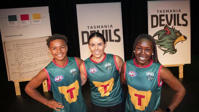 Shaun kongwa, Rachael Duffy and Priscilla Odwogo during the Tasmania Football Club launch at Hobart. Picture: Chris Kidd