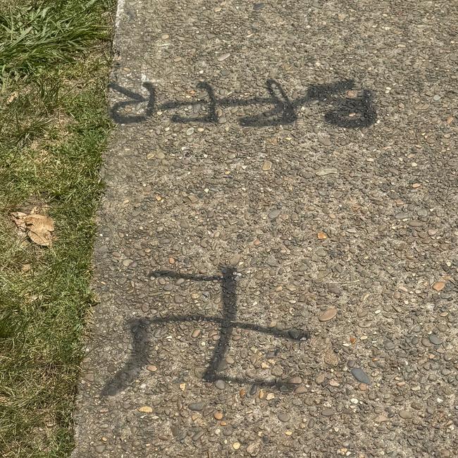 NAZI swastika seen on a footpath on Elaine Ave in Avalon Beach. Photo: Snap Send Solve