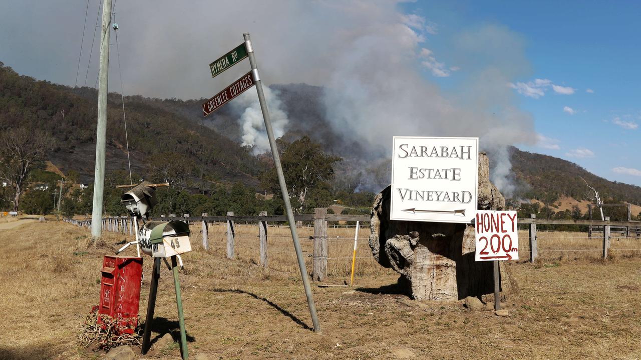 Firefighters brace for the worst as fires continue to burn in the Canungra and Sarabah regions. Picture: NIGEL HALLETT