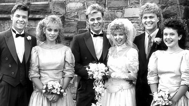 Actors (l-r) Guy Pearce, Annie Jones, Jason Donovan, Kylie Minogue, Craig McLachlan and Sasha Close in 1987 scene from <i>Neighbours. </i>Many of the actors from Ramsay St turned to music.