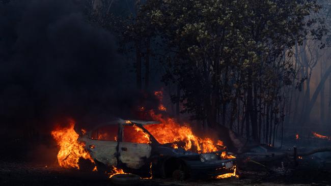 A fire destroyed a house and cars at a property on Bridgemary Cres, Girraween on Monday. Picture: Che Chorley