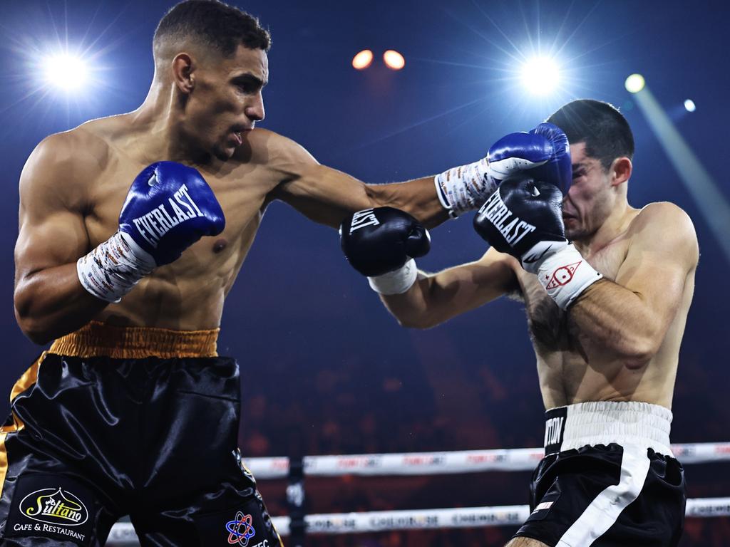 Mounir Fathi plants one on Anton Markovic at the No Limit Boxing fight night at WIN Entertainment Centre on July 10, 2024. Picture: No Limit Boxing/Gregg Porteous