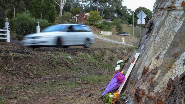 Flowers left at the scene of a fatal accident on Montacute road near Maryvale road in Athelstone, killing two local 17 year old boys. Picture: Brenton Edwards