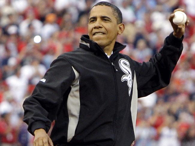 USA President Barack Obama throws out the first pitch to St Louis Cardinals first baseman Albert Pujols before the start of the MLB All-Star baseball game in St Louis 14/07/2009. Picture: Ap