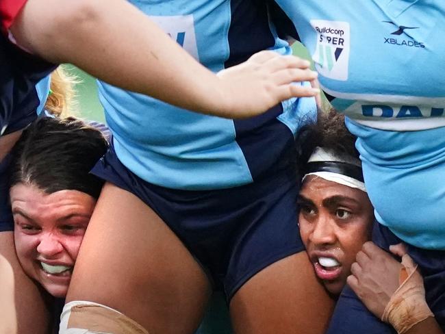 Sera Naiqama (right) of the Waratahs looks on in a scrum during the Round 1 Super W rugby match between the Melbourne Rebels Women and NSW Waratahs Women at AAMI Park in Melbourne, Friday, February 14, 2020. (AAP Image/Scott Barbour) NO ARCHIVING, EDITORIAL USE ONLY