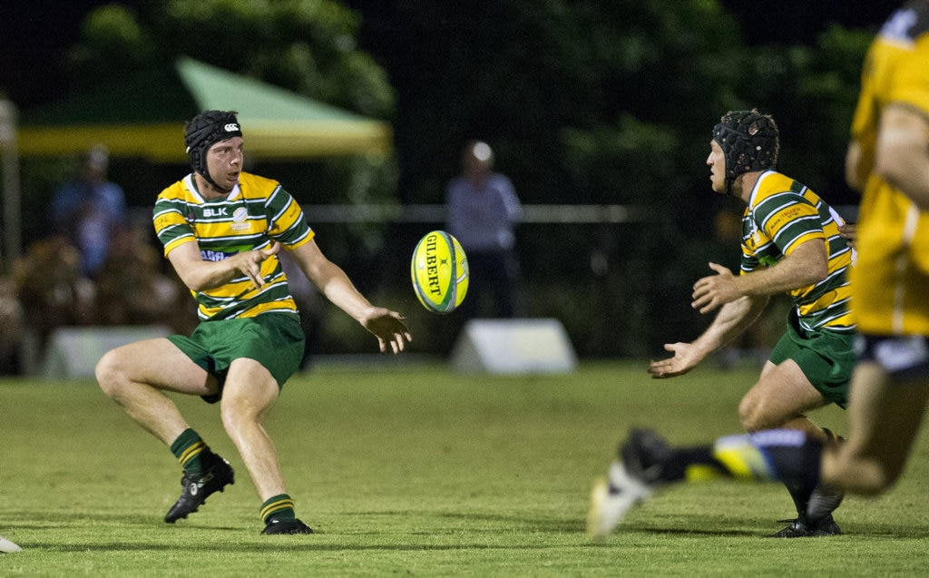 Darling Downs player Angus Ramsey passes to Stuart Bougoure. Rugby Union, Cattleman's Cup, Darling Downs vs Central Qld Brahmans. Saturday, 3rd Mar, 2018. Picture: Nev Madsen