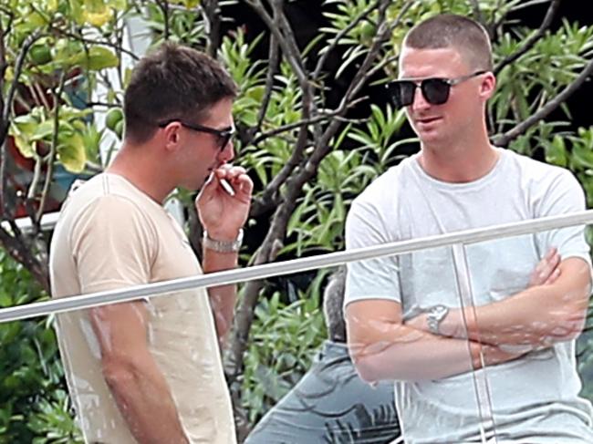 Shaun Marsh smokes while chatting to Jackson Bird. Picture: Dimex