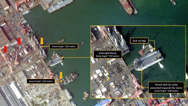 New satellite photos have revealed the construction of a new fleet of D-Day-style landing barges needed to surge troops and tanks over a beach. Picture: @AllSourceA/X