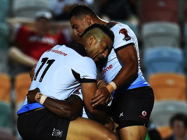 Rugby League World Cup RLWC opening round match between Fiji Bati v USA Hawks from 1300 Smiles Stadium, Townsville.  Fiji's Akuila Uate celebrates his try with team mates.   Picture: Zak Simmonds