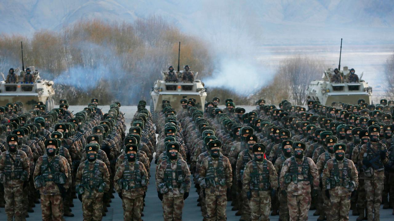 China’s People's Liberation Army assembles during military training at Pamir Mountains in Kashgar in northwestern China. Picture: STR/AFP