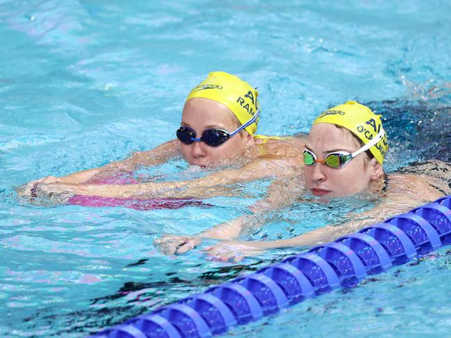 BIRMINGHAM.  25/07/2022 . Australian swim team hits the competition pool for the first time after arriving in Birmingham for the Commonwealth Games.  Australian swimmer Mollie O'Callaghan and Ella Ramsay  . Photo by Michael Klein