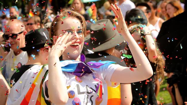 'Yes' supporters celebrate outside the State Library in Melbourne after watching the live result of the Same Sex Marriage Plebiscite on TV in 2017. Picture: Stuart McEvoy (The Australian.)