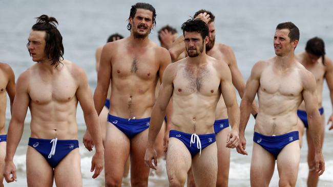 Western Bulldogs players hit the surf in Torquay. Picture: Michael Klein