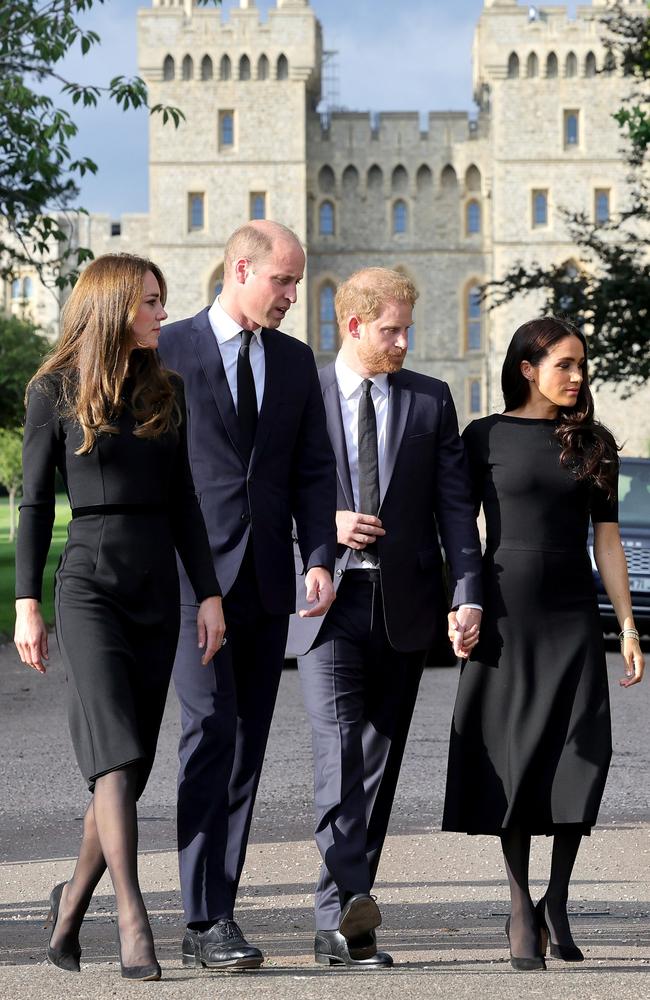 The Princess and Prince or Wales are joined by Prince Harry and Meghan Markle outside Windsor Castle, where the greeted fans and looked at flowers left by mourners. Picture: Getty Images